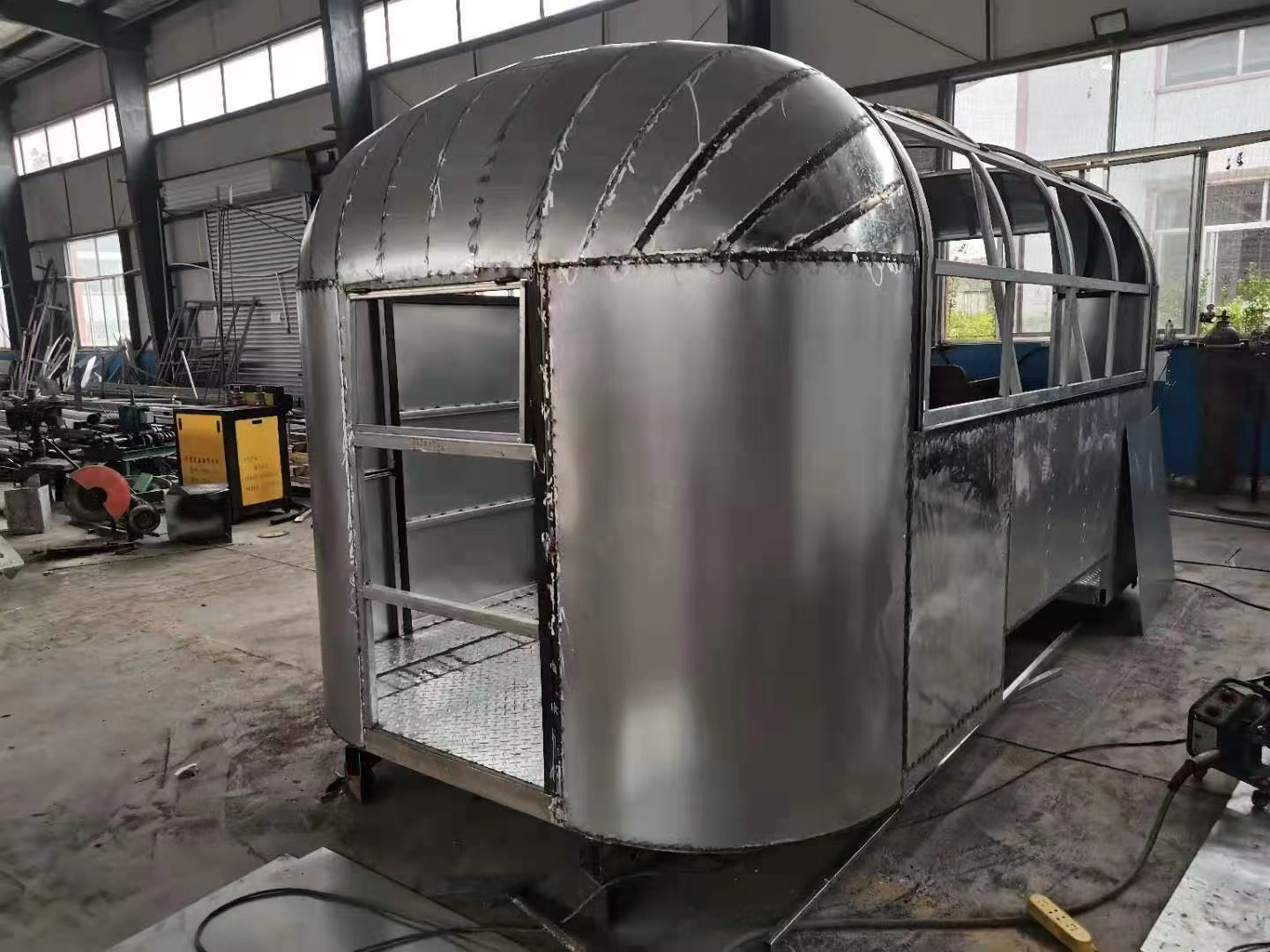VINTAGE AIRSTREAM TRAILER IN BUILTING